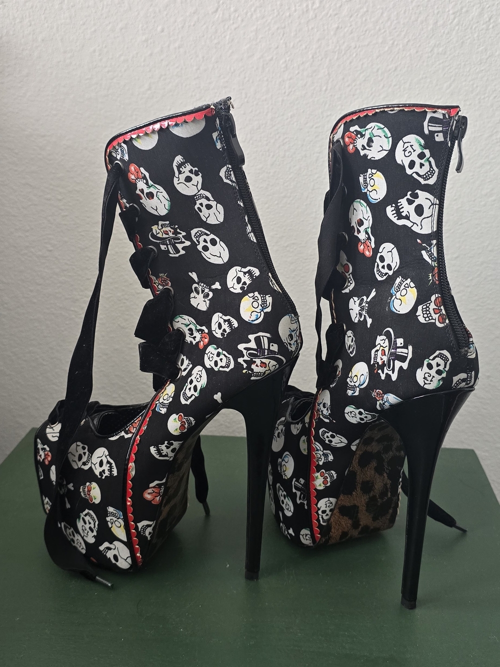 Bettie Page Black Skull-Print Platform Heel Booties with Red Trim